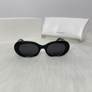 Gentle Monster Black Oval Cat-Eye Sunglasses, Retro Y2K Style.